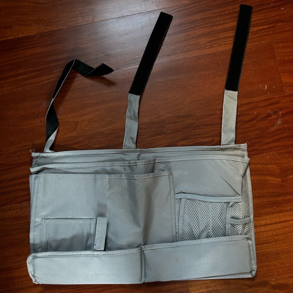 New organizer that velcro hangs on side of bed. Great for a dorm room